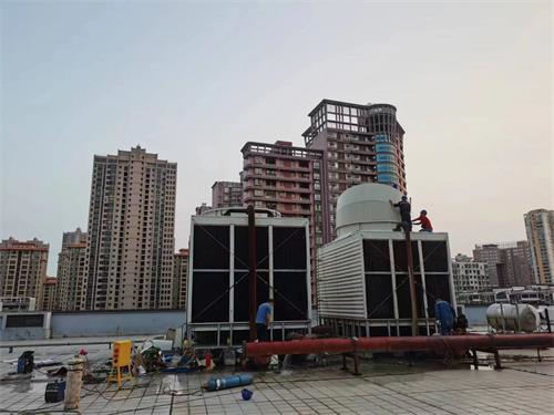 济宁横流冷却塔填料更换方式及优缺点(方形横流式冷却塔)